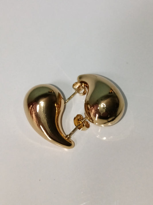 Aretes globo dorado de acero inoxidable.